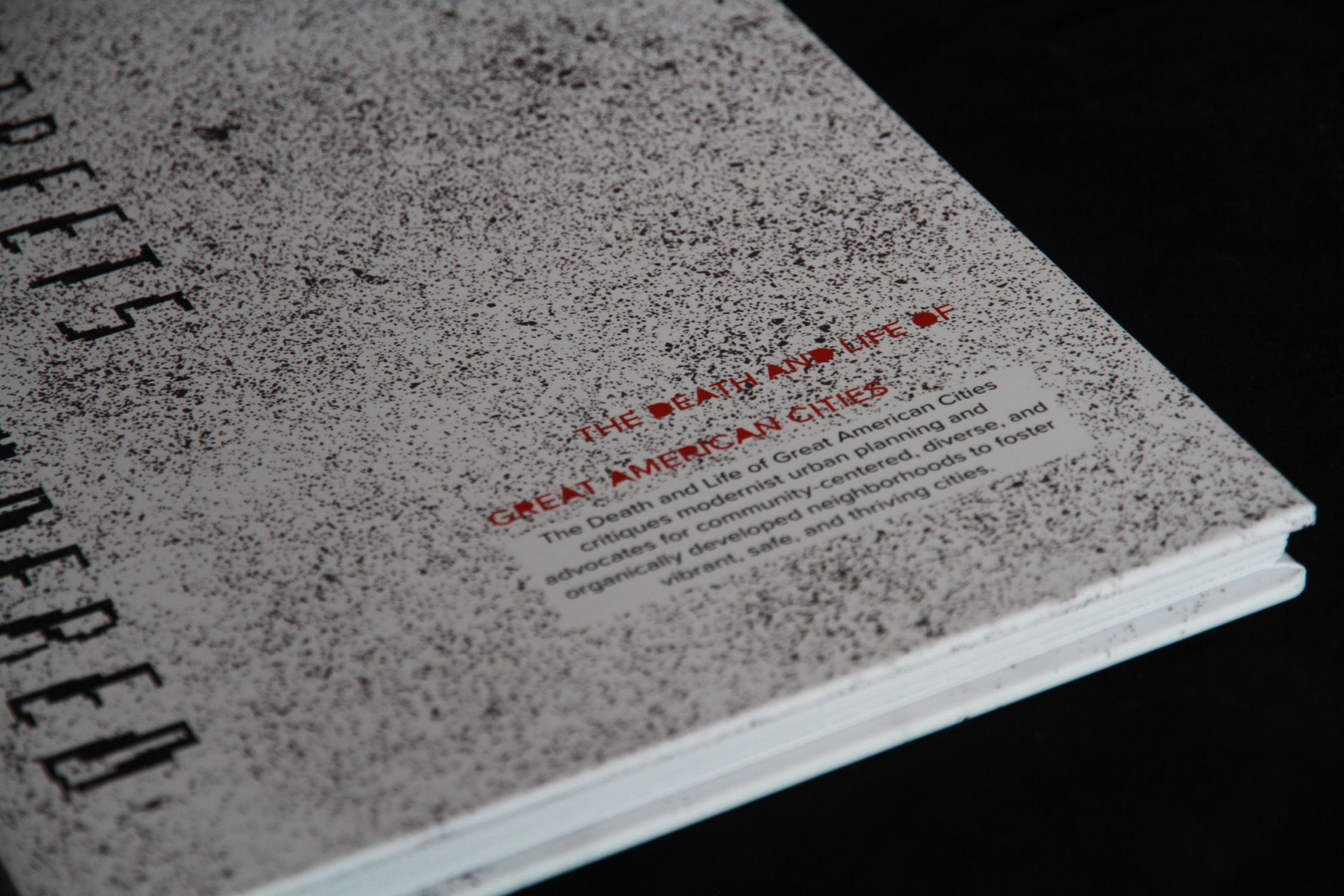 Interior spread showing urban photography and text